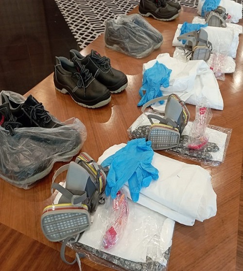 Protective equipment prepared for contaminated-site fieldwork.